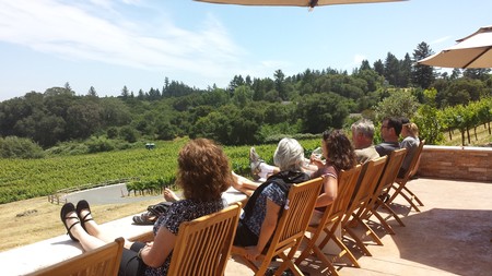 Tasting room guests enjoying the patio view